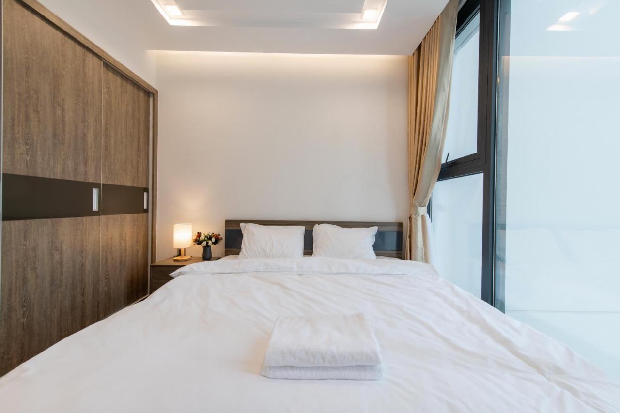 Hi-Home Suites - Vinhomes Metropolis ハノイ市 エクステリア 写真