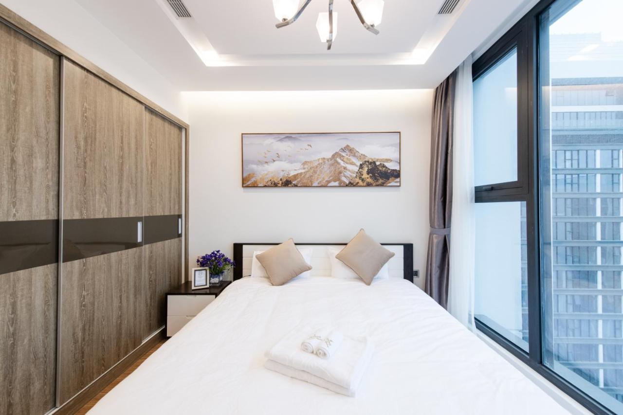 Hi-Home Suites - Vinhomes Metropolis ハノイ市 エクステリア 写真