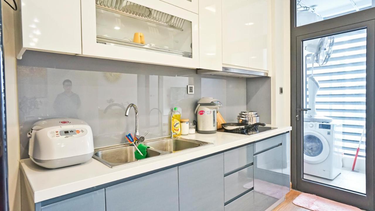 Hi-Home Suites - Vinhomes Metropolis ハノイ市 エクステリア 写真